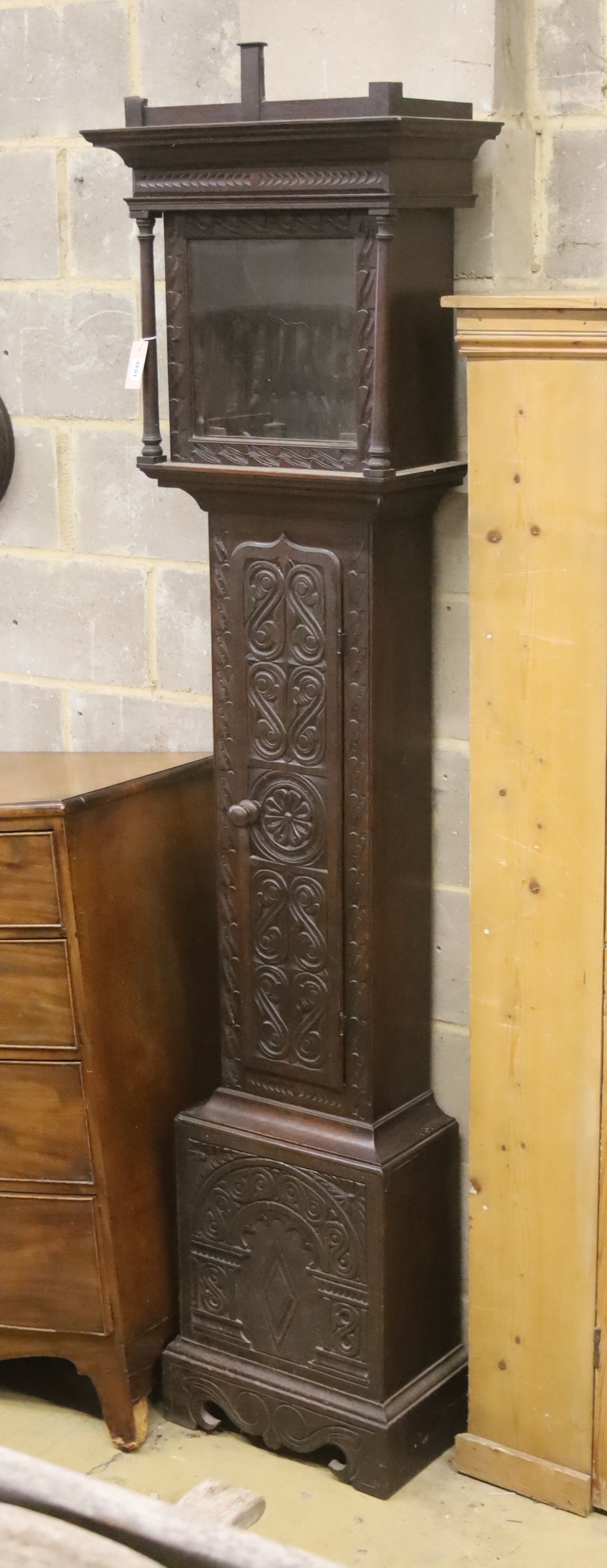 An 18th century style carved oak longcase clock case, height 216cm